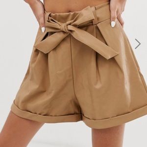 Faux leather belted shorts